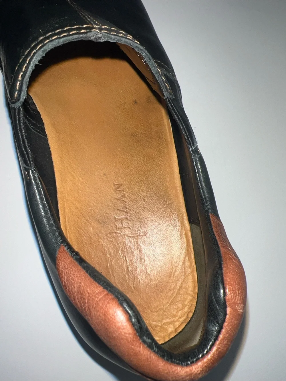 Cole Haan Black Leather Slip-On Loafers with Brown Heel Detail